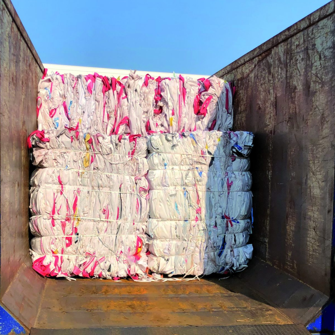 Balers in a container